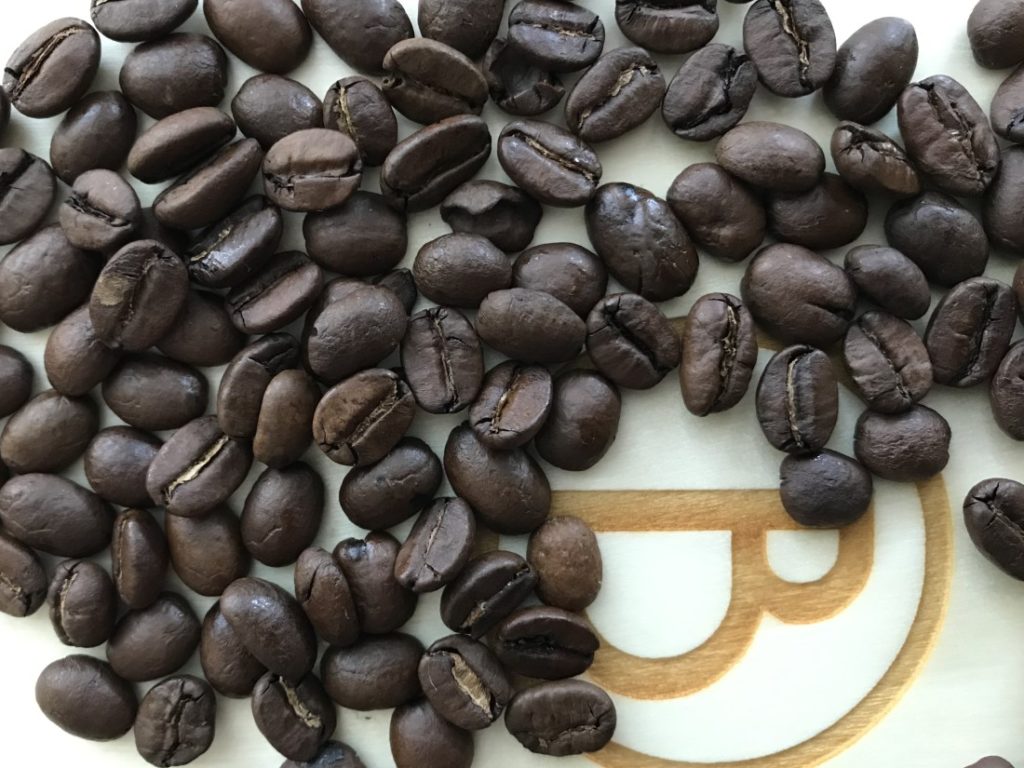 Zlaté Zrnko - zrná kávy Emília