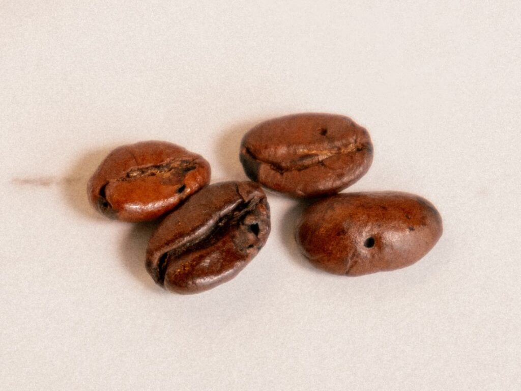 DM Bio Espresso - zrná poškodené hmyzom
